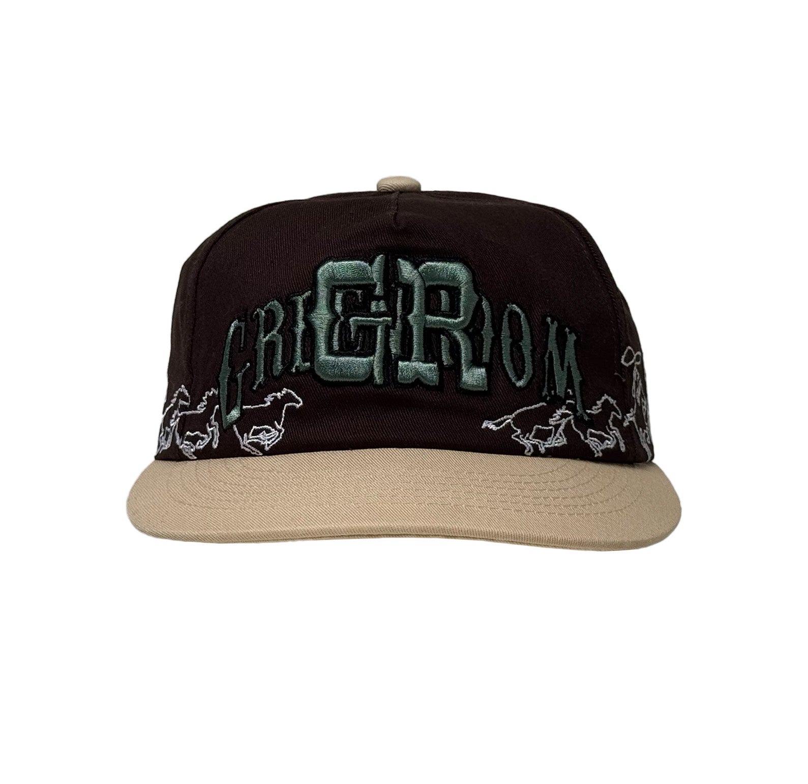 Black and beige cap with embroidered text and horse designs on a white background