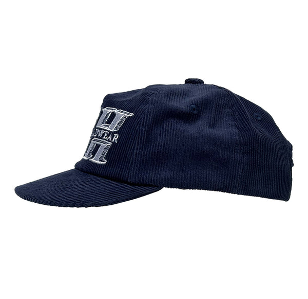 Navy blue cap with a logo on a white background