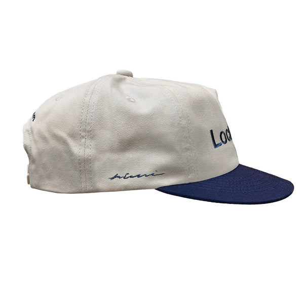 LOCKED IN CAP