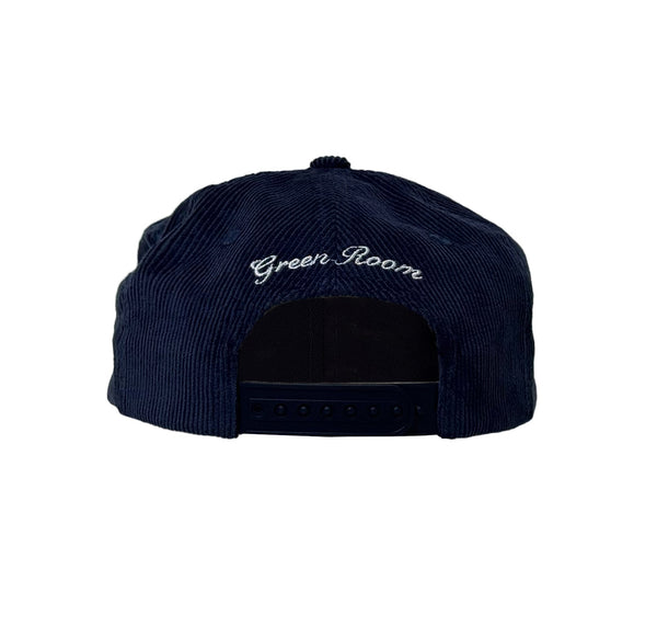 Navy blue cap with 'Green Room' embroidery on a white background