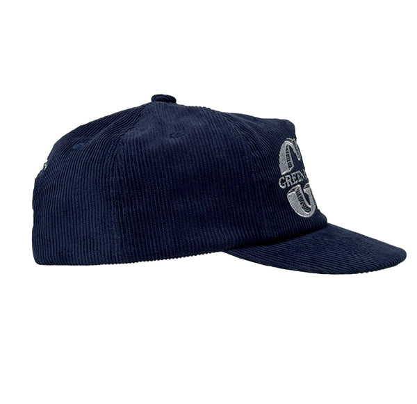Navy blue cap with a logo on a white background